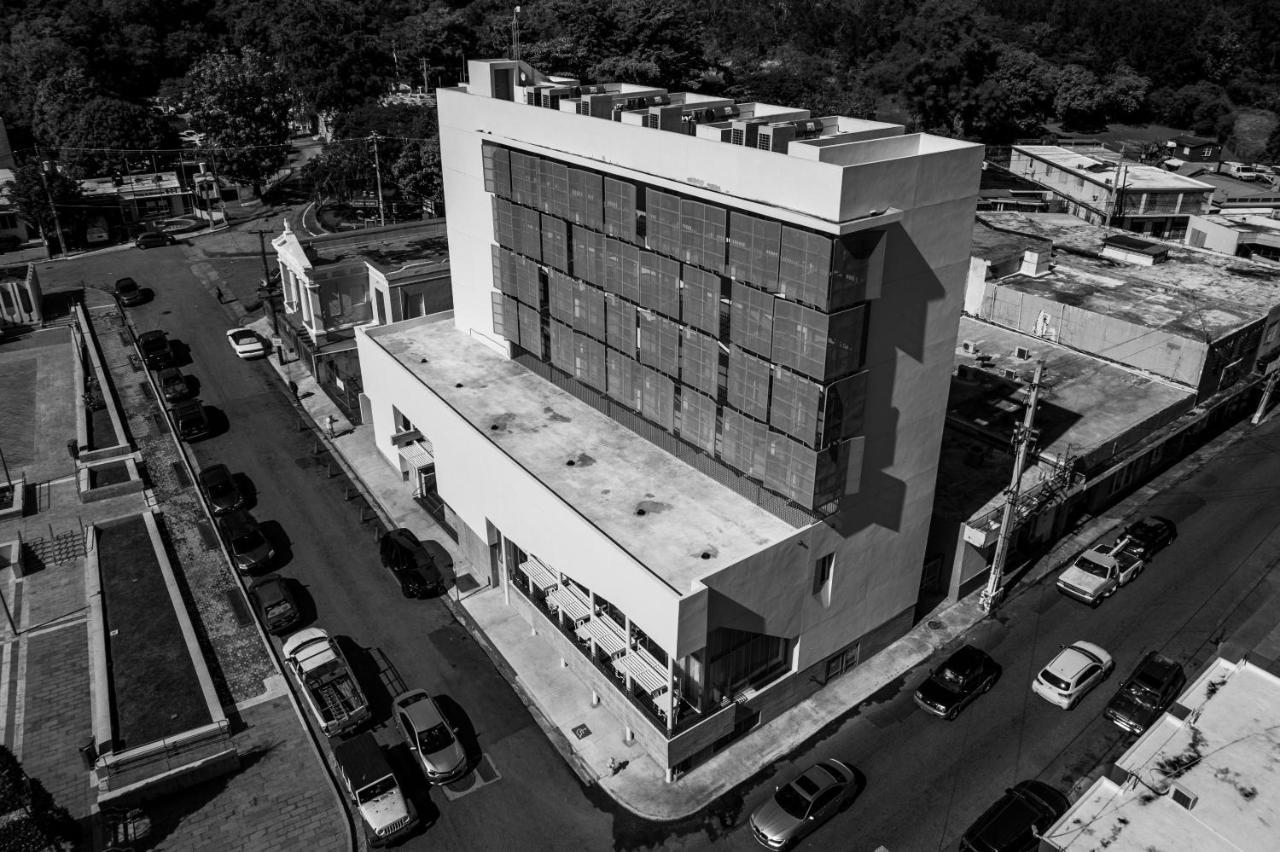 Royal Delonix Hotel Penuelas Bagian luar foto