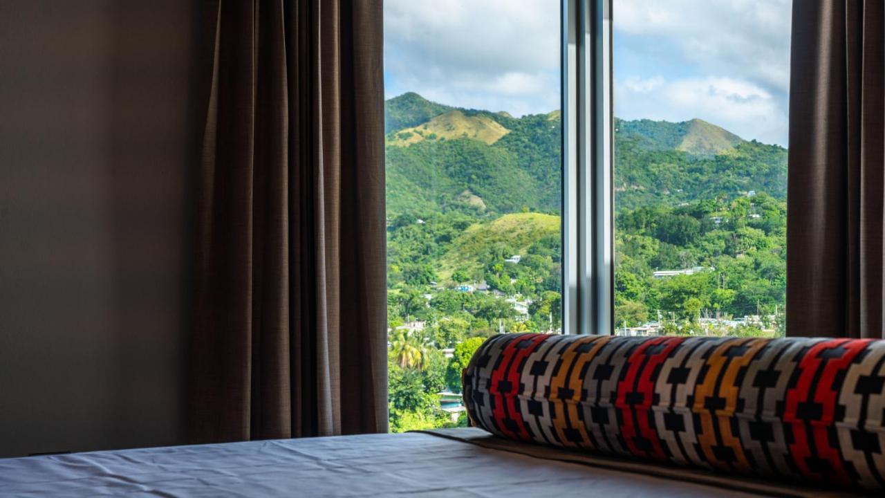 Royal Delonix Hotel Penuelas Bagian luar foto