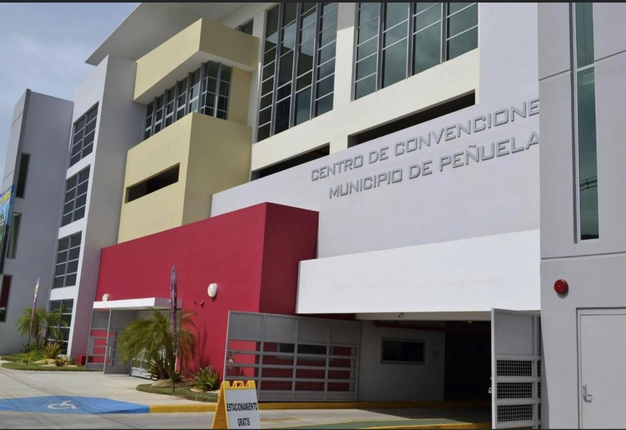 Royal Delonix Hotel Penuelas Bagian luar foto
